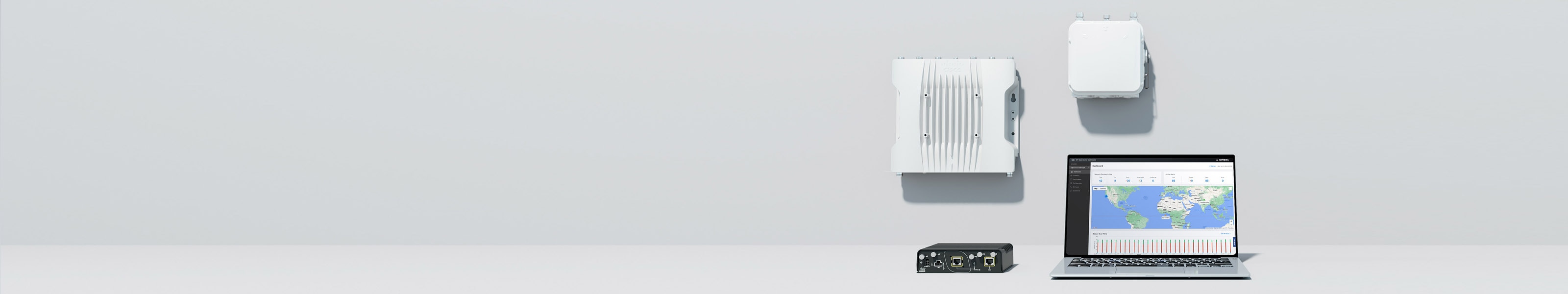 "Cisco IW9165E, IW9167E, IW9165D, and a laptop displaying a management tool interface