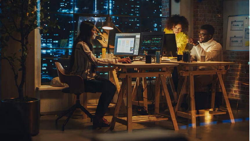 Workers watching online courses in security on their computers 