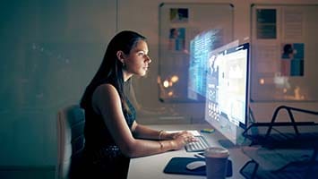Women working on computer in office